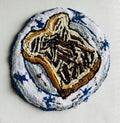 Textile artwork of the Dutch breakfast Broodje Hagelslag by Studio Juuls